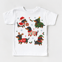 white tee with five dachshunds in Christmas costumes, holly and snowflakes