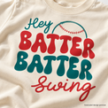 Generated design detail preview of the Hey Batter Batter Swing artwork; simulated mockup, not a photograph of actual print quality.