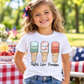 Tastes Like Freedom three ice cream cone tee in White, generated lifestyle preview