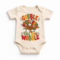 Gobble Till You Wobble Turkey design on a natural bodysuit