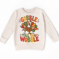 Gobble Till You Wobble Turkey design on a natural sweatshirt
