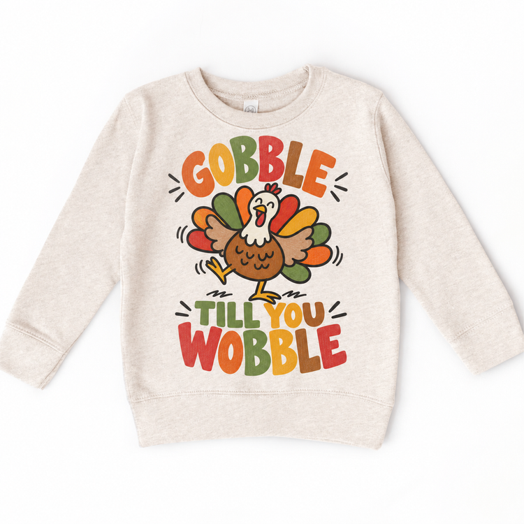 Gobble Till You Wobble Turkey design on a natural sweatshirt