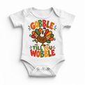 Gobble Till You Wobble Turkey design on a white bodysuit