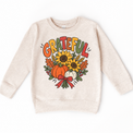 Grateful Sunflower Pumpkin design on a natural sweatshirt