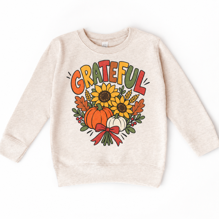 Grateful Sunflower Pumpkin design on a natural sweatshirt
