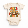 Roll With It Thanksgiving design on a natural bodysuit