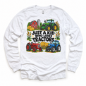 Just a Kid Who Loves Tractors design on a white long sleeve tee