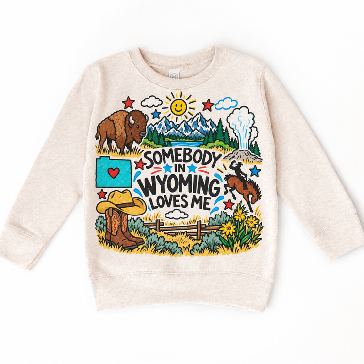 Somebody in Wyoming Loves Me design on a natural sweatshirt