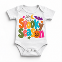 Spooky Season colorful Halloween ghost and bat design on a white bodysuit
