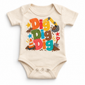 Dig Dig Dig design on a natural bodysuit