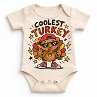 Coolest Turkey graphic on natural bodysuit, front view on white background