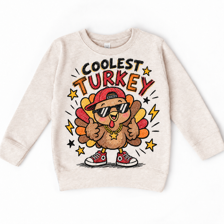 Coolest Turkey graphic on natural sweatshirt, front view on white background