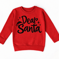 Dear Santa Christmas shirt features black script lettering, a Santa hat and stars. Shown on red sweatshirt, front view.