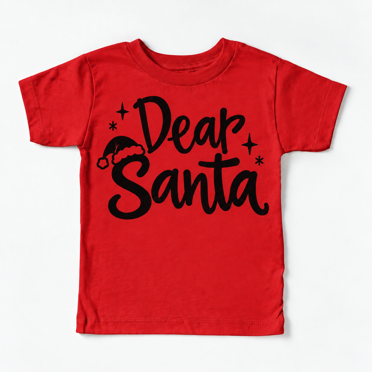 Dear Santa Christmas shirt features black script lettering, a Santa hat and stars. Shown on red tee, front view.