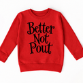 Better Not Pout Christmas shirt features playful black lettering stacked in three lines. Shown on red sweatshirt, front view.
