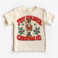 natural tee with vintage nutcracker, holly and Toy Soldier Christmas Co. lettering