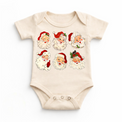 Six vintage Santa faces with red hats and holly on a natural baby bodysuit