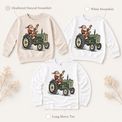 Santa tractor Christmas design on natural and white sweatshirts and a white long sleeve tee