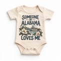 Someone in Alabama Loves Me design on a natural baby bodysuit