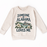 Someone in Alabama Loves Me design on a natural beige sweatshirt