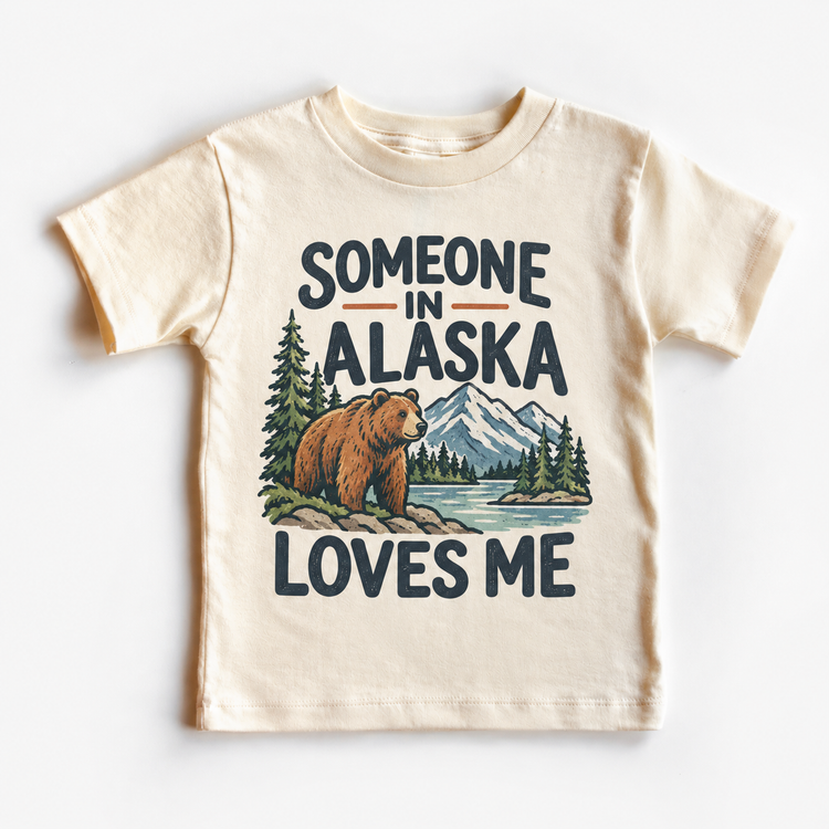 Someone in Alaska Loves Me design on a natural beige short sleeve T-shirt