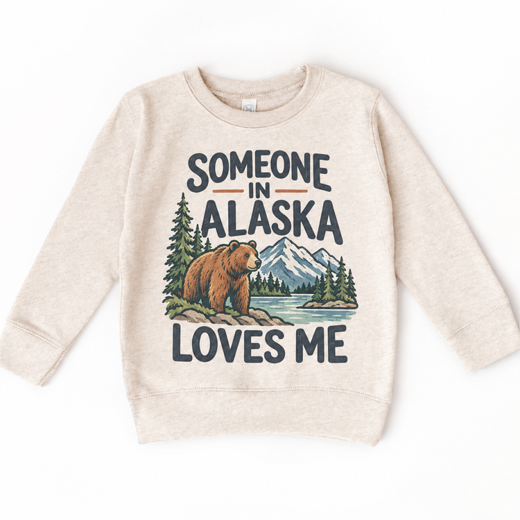 Someone in Alaska Loves Me design on a natural beige sweatshirt