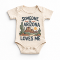 Someone in Arizona Loves Me design on a natural beige baby bodysuit