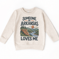 Someone in Arkansas Loves Me design on a natural beige sweatshirt