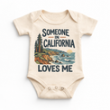Someone in California Loves Me design on a natural beige baby bodysuit