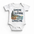 Someone in California Loves Me design on a white baby bodysuit