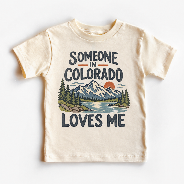 Someone in Colorado Loves Me design on a natural beige short sleeve T-shirt