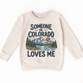 Someone in Colorado Loves Me design on a natural beige sweatshirt