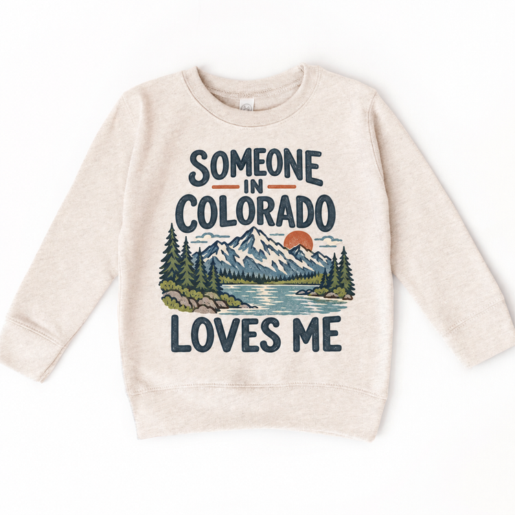 Someone in Colorado Loves Me design on a natural beige sweatshirt