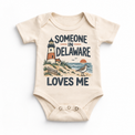 Someone in Delaware Loves Me design on a natural beige baby bodysuit