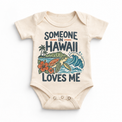 Someone in Hawaii Loves Me design on a natural beige baby bodysuit