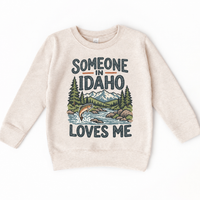 Someone in Idaho Loves Me design on a natural beige sweatshirt