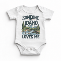 Someone in Idaho Loves Me design on a white baby bodysuit