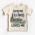 Someone in Illinois Loves Me design on a natural beige short sleeve T-shirt