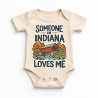 Someone in Indiana Loves Me design on a natural beige baby bodysuit