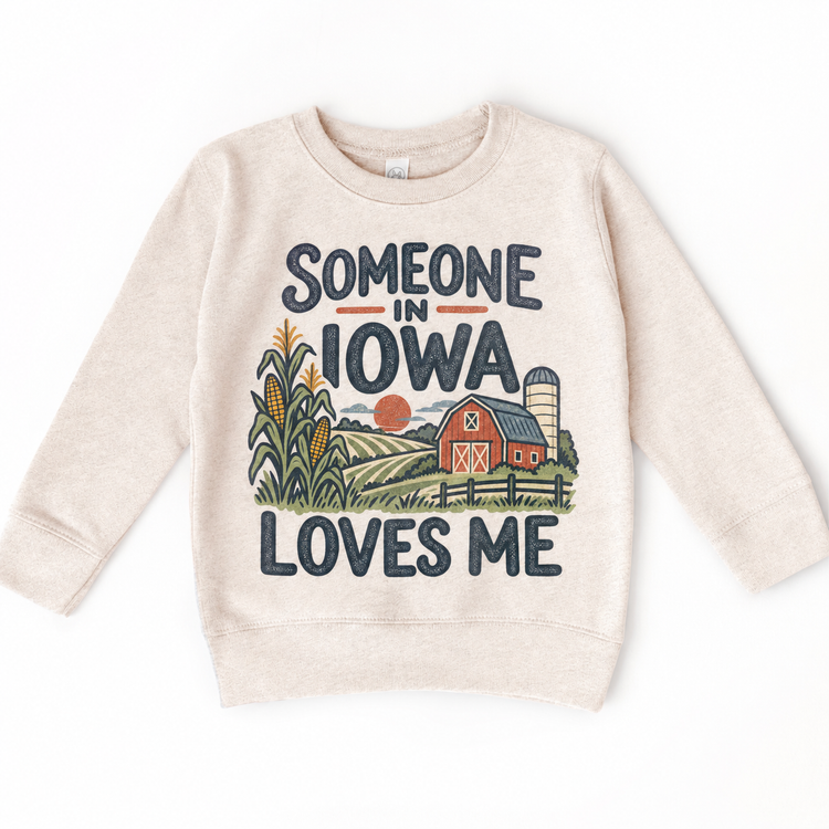 Someone in Iowa Loves Me design on a natural beige sweatshirt