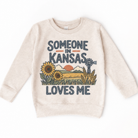 Someone in Kansas Loves Me design on a natural beige sweatshirt
