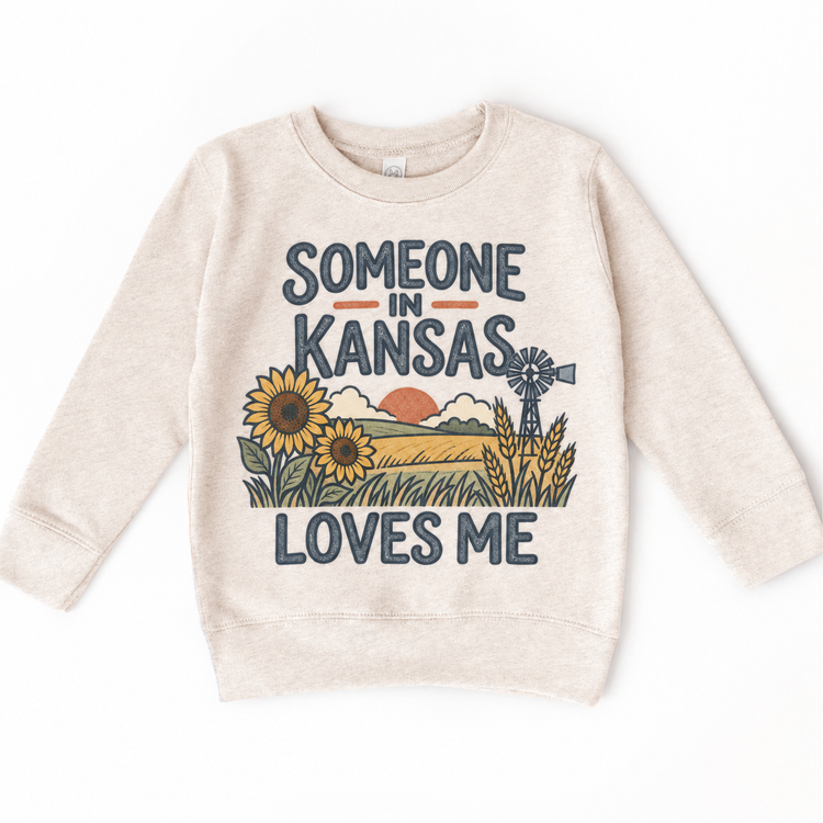 Someone in Kansas Loves Me design on a natural beige sweatshirt