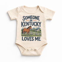 Someone in Kentucky Loves Me design on a natural beige baby bodysuit
