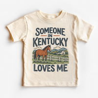 Someone in Kentucky Loves Me design on a natural beige short sleeve T-shirt
