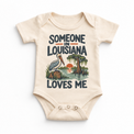 Someone in Louisiana Loves Me design on a natural beige baby bodysuit