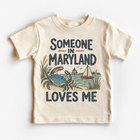 Someone in Maryland Loves Me design on a natural beige short sleeve T-shirt