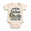 Someone in Michigan Loves Me design on a natural beige baby bodysuit