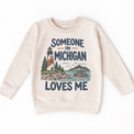 Someone in Michigan Loves Me design on a natural beige sweatshirt