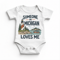 Someone in Michigan Loves Me design on a white baby bodysuit