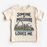Someone in Missouri Loves Me design on a natural beige short sleeve T-shirt